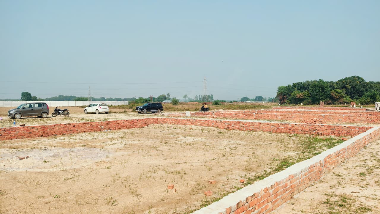 Plot corner marked with brick boundary